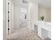 Hallway featuring a carpeted floor and adjacent view of the bedroom at 4376 S Summit E St, Gilbert, AZ 85297