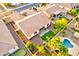 Aerial view of backyard with a pool, turf area, and patio at 4545 S Ellesmere St, Gilbert, AZ 85297