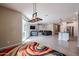 Open-concept living space connecting to the kitchen and offers a light-filled airy space at 4593 W Bush Bean Way, San Tan Valley, AZ 85144