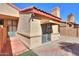 Rear exterior showcasing a private patio with awning, ideal for relaxation and outdoor gatherings at 4843 W Del Rio St, Chandler, AZ 85226