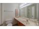 Bathroom featuring single sink vanity with cream counters and tiled flooring at 4843 W Del Rio St, Chandler, AZ 85226