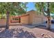 Beige single-story home with a well-kept yard and driveway leading to a two-car garage at 4843 W Del Rio St, Chandler, AZ 85226