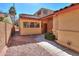 Inviting front entrance with decorative brickwork and well-manicured landscaping at 4843 W Del Rio St, Chandler, AZ 85226