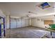 Spacious garage with high ceilings, ideal for parking and storage at 5071 W Warren Dr, Casa Grande, AZ 85194