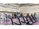 Row of cardio treadmills and other exercise machines in modern community recreation center gym at 5106 E Umber Rd, San Tan Valley, AZ 85143