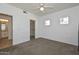 Bright bedroom boasting carpet, ceiling fan, and natural light, offering a comfortable living space at 5335 E Shea Blvd # 2126, Scottsdale, AZ 85254