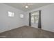 A cozy bedroom featuring carpet floors, ceiling fan, and bright windows for natural light at 5335 E Shea Blvd # 2126, Scottsdale, AZ 85254