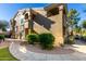 Condo building with a stucco exterior and a nice garden at 5335 E Shea Blvd # 2126, Scottsdale, AZ 85254