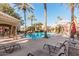 Community pool area with lounge seating, tables and chairs at 5335 E Shea Blvd # 2126, Scottsdale, AZ 85254