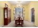 A formal dining room with chandelier lighting, and a china cabinet for your collectibles at 5462 W Geronimo St, Chandler, AZ 85226