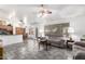 Cozy living room with tile flooring, neutral walls, and comfortable seating arrangements at 5462 W Geronimo St, Chandler, AZ 85226