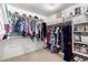 Spacious walk-in closet with ample storage, rods for hanging clothes and shelving for accessories at 5462 W Geronimo St, Chandler, AZ 85226