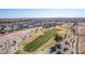 Aerial view of desert golf course and surrounding homes at 5550 N Luna Dr, Eloy, AZ 85131