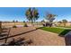 Backyard patio area includes views of a golf course at 5550 N Luna Dr, Eloy, AZ 85131