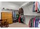 Spacious closet with rods and shelving for storage with carpeted floors at 5550 N Luna Dr, Eloy, AZ 85131