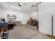 A spacious garage interior with a white walls, concrete floor, and ample storage space at 5550 N Luna Dr, Eloy, AZ 85131