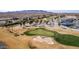 Aerial view features a lush green golf course at Robson Ranch, perfect for avid golfers at 5550 N Luna Dr, Eloy, AZ 85131