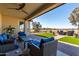 Inviting covered patio with comfortable seating and a serene outdoor view at 5550 N Luna Dr, Eloy, AZ 85131