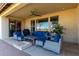 Relaxing covered patio with cozy seating and a view, perfect for outdoor lounging at 5550 N Luna Dr, Eloy, AZ 85131