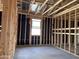 Home construction featuring a framed room with a window, wiring, and insulation at 5583 S 240Th Ln, Buckeye, AZ 85326