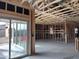 Exposed framing of a room with sliding glass doors leading outside at 5583 S 240Th Ln, Buckeye, AZ 85326