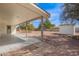 View of the backyard featuring a covered patio area and a storage shed at 6655 E Rustic Dr, Mesa, AZ 85215