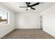 Bright bedroom featuring neutral carpet and a window at 6655 E Rustic Dr, Mesa, AZ 85215