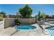 Relaxing hot tub with clear blue water, surrounded by lush landscaping and outdoor seating area at 6711 E Camelback Rd # 81, Scottsdale, AZ 85251