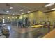 Spacious gym with state-of-the-art exercise equipment, ceiling fans, and ample lighting at 678 E Cobble Stone Dr, Queen Creek, AZ 85140