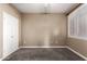 Bedroom with neutral walls, a window with blinds, and a double door closet at 7009 E Acoma Dr # 1046, Scottsdale, AZ 85254