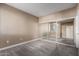 Bedroom featuring mirrored closet doors and neutral walls and carpet at 7009 E Acoma Dr # 1046, Scottsdale, AZ 85254