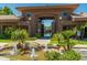 Welcoming entrance to the community, featuring a water fountain, mature landscaping and glimpses of the pool at 7009 E Acoma Dr # 1046, Scottsdale, AZ 85254