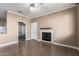 Bright living room with laminate flooring and cozy fireplace at 7009 E Acoma Dr # 1046, Scottsdale, AZ 85254