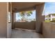 Outdoor patio space with views of mature trees and parking at 7009 E Acoma Dr # 1046, Scottsdale, AZ 85254