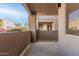 View from the patio showing other condo buildings and mature landscaping at 7009 E Acoma Dr # 1046, Scottsdale, AZ 85254