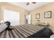 Bedroom featuring carpet flooring, a closet and a desk at 815 E Laddoos Ave, San Tan Valley, AZ 85140