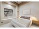 Bedroom featuring a window, modern art, and side tables at 8214 E Kael St, Mesa, AZ 85207