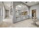 Beautiful foyer with archways, skylights, tile flooring, columns, fountain, and neutral wall color at 8214 E Kael St, Mesa, AZ 85207