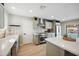 Bright, stylish kitchen with stainless appliances, updated fixtures, and decorative tile backsplash at 8432 E Keim Dr, Scottsdale, AZ 85250