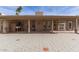 Spacious back patio with a tiled walkway and views of the backyard and nearby landscaping at 8544 E San Lorenzo Dr, Scottsdale, AZ 85258