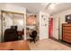 Bedroom featuring a built-in desk, mirrored closet doors and a neutral color scheme at 8544 E San Lorenzo Dr, Scottsdale, AZ 85258