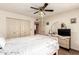 Comfortable bedroom featuring a ceiling fan and neutral colors at 8544 E San Lorenzo Dr, Scottsdale, AZ 85258