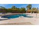 Inviting pool with spa and mature landscaping at 8544 E San Lorenzo Dr, Scottsdale, AZ 85258