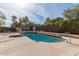 Backyard pool with mature landscaping at 8544 E San Lorenzo Dr, Scottsdale, AZ 85258