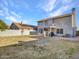 This two-story home boasts solar panels, a covered patio, a table with chairs, and a grill at 8926 W Lockland Ct, Peoria, AZ 85382