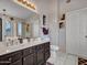 Bathroom featuring a double vanity, lots of counter space and modern fixtures at 8926 W Lockland Ct, Peoria, AZ 85382