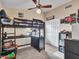 Bedroom featuring a cool lofted bed, study desk, and neat storage solutions at 8926 W Lockland Ct, Peoria, AZ 85382