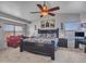 Spacious main bedroom featuring a sitting area and large windows with natural light at 8926 W Lockland Ct, Peoria, AZ 85382