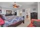 Spacious main bedroom featuring an ensuite bathroom and open layout at 8926 W Lockland Ct, Peoria, AZ 85382