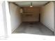 Spacious single-car garage with shelving, offering ample storage solutions at 10115 E Mountain View Rd # 1119, Scottsdale, AZ 85258